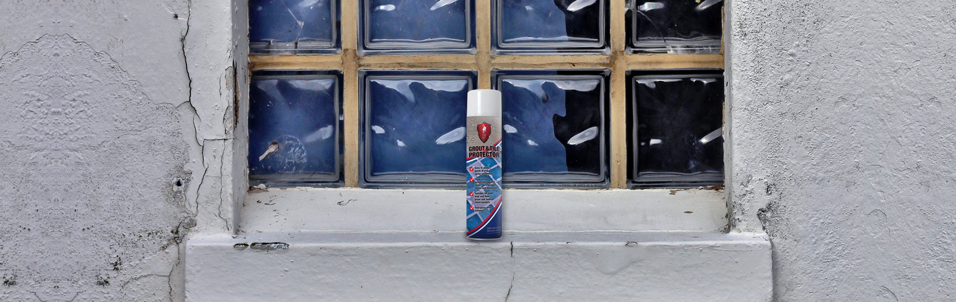 LTP Grout and Tile Protector spray can on a grey stone window ledge to repair the surface