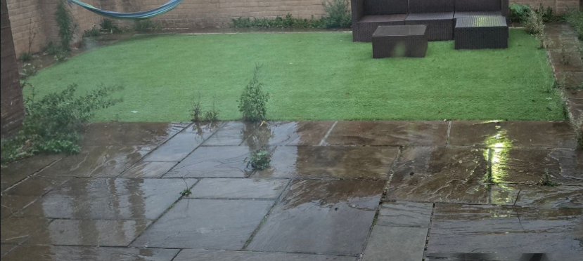 stone patio in wet weather rain 